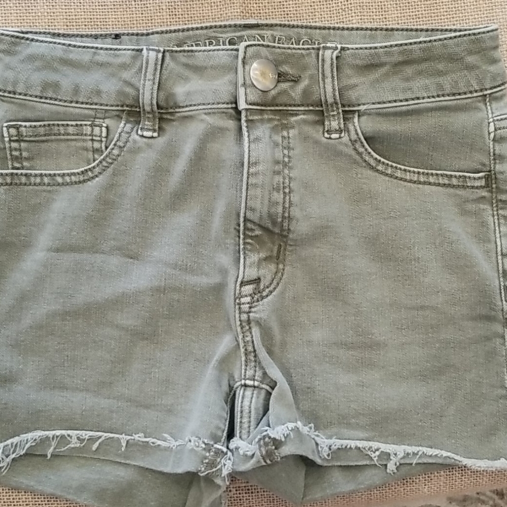 American Eagle faded olive green distressed shorts